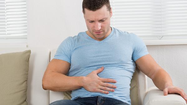 男性腰疼腹脹看什么科室