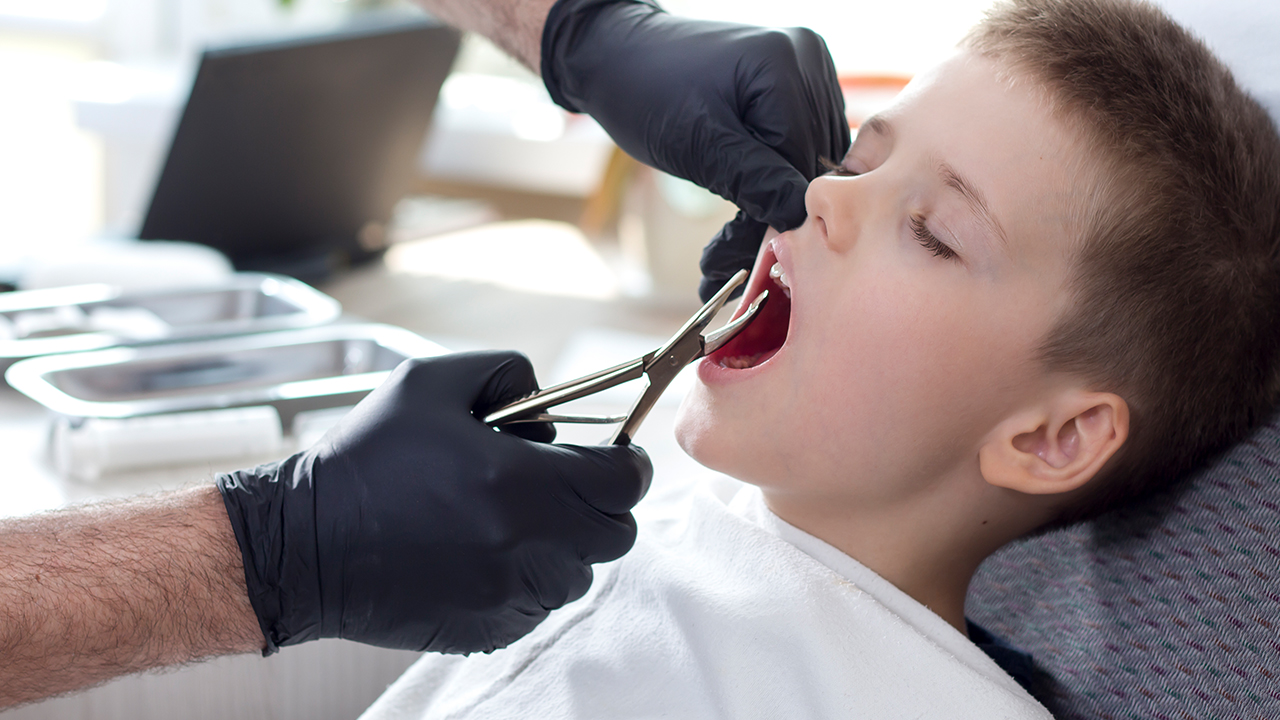 拔牙后浑身无力怕冷怎么回事