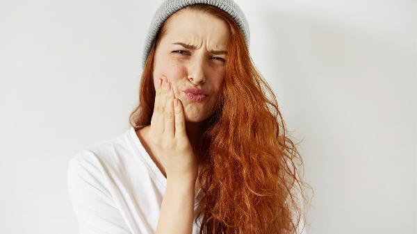 口腔潰瘍的癥狀是什么