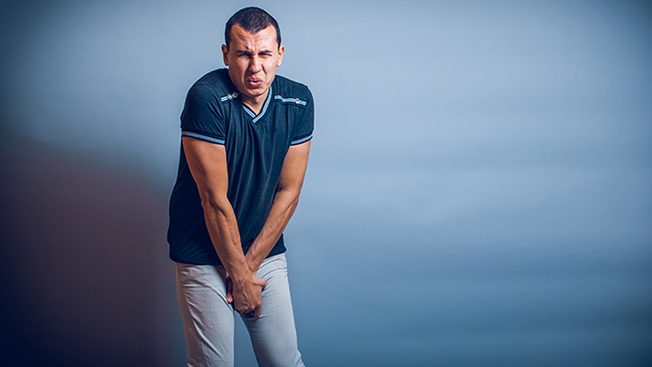 小便刺痛龟头流脓是怎么回事呀